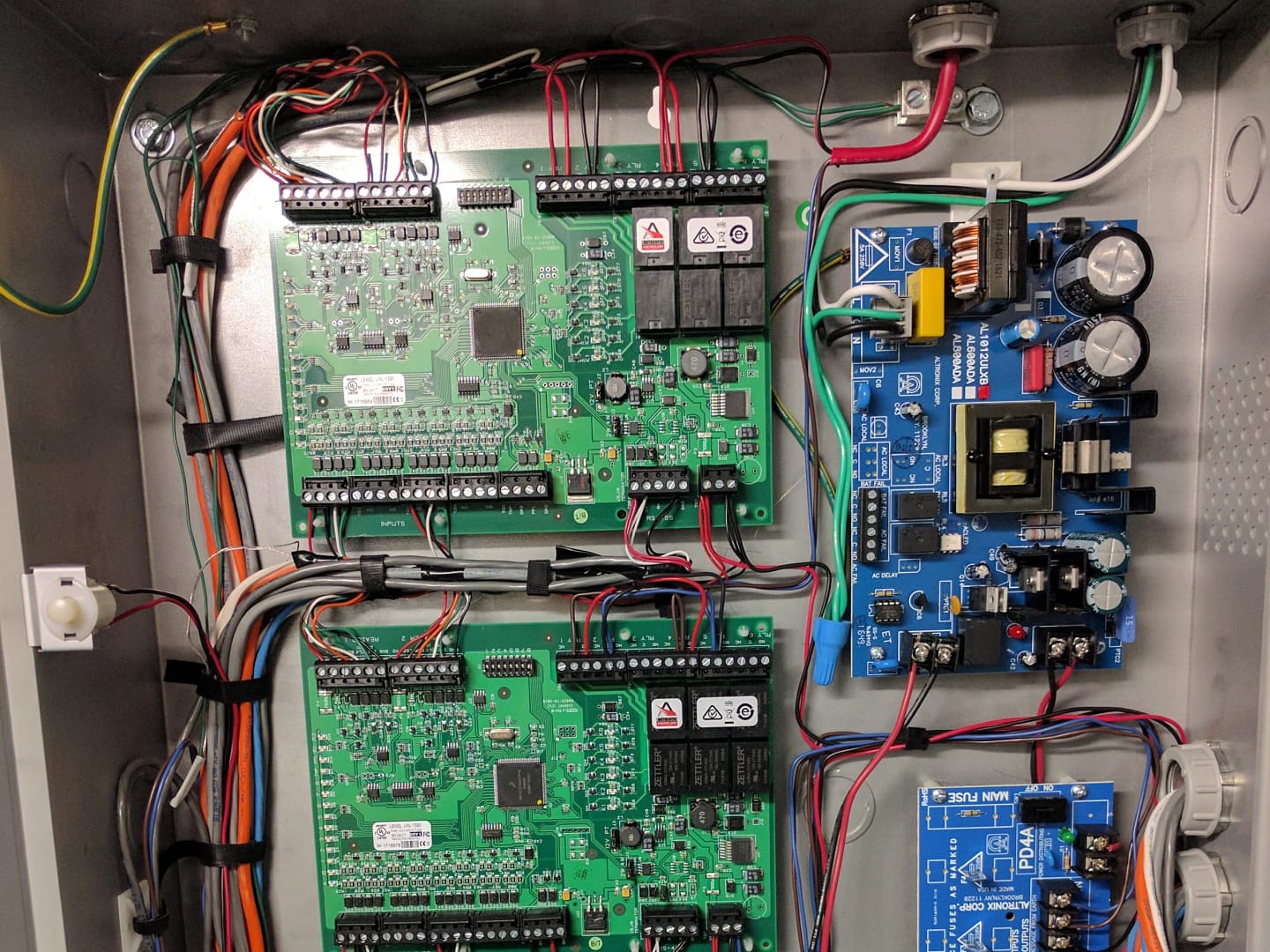 Commercial Electrical Access Control System installation Commercial Electrical Access Control System installation with neatly routed wires and control boards